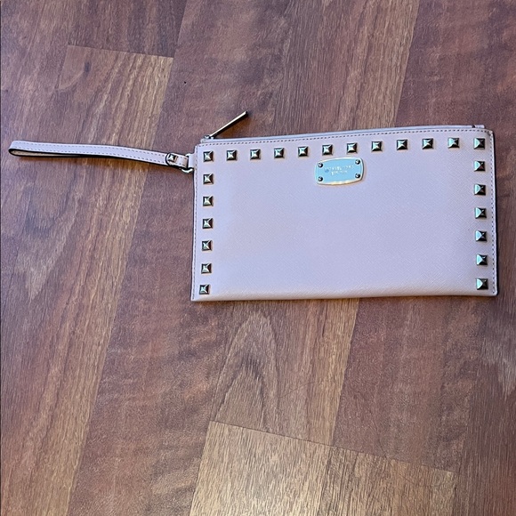 Michael Kors Handbags - Like new Michael Kors Blush Wristlet Clutch with Stud Accents